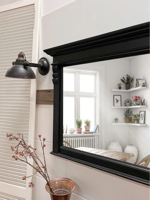 "Nerom" - Black wooden mirror with a retro look